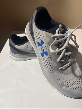 Under Armour Men’s Light Gray and Blue Charged Impulse Running Sneakers